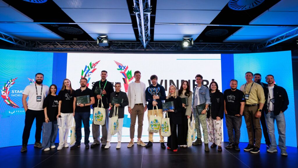 Finalists and organisers at Startup World Cup Ukraine 2026 powered by EIT Community Hub Ukraine on stage in Kyiv