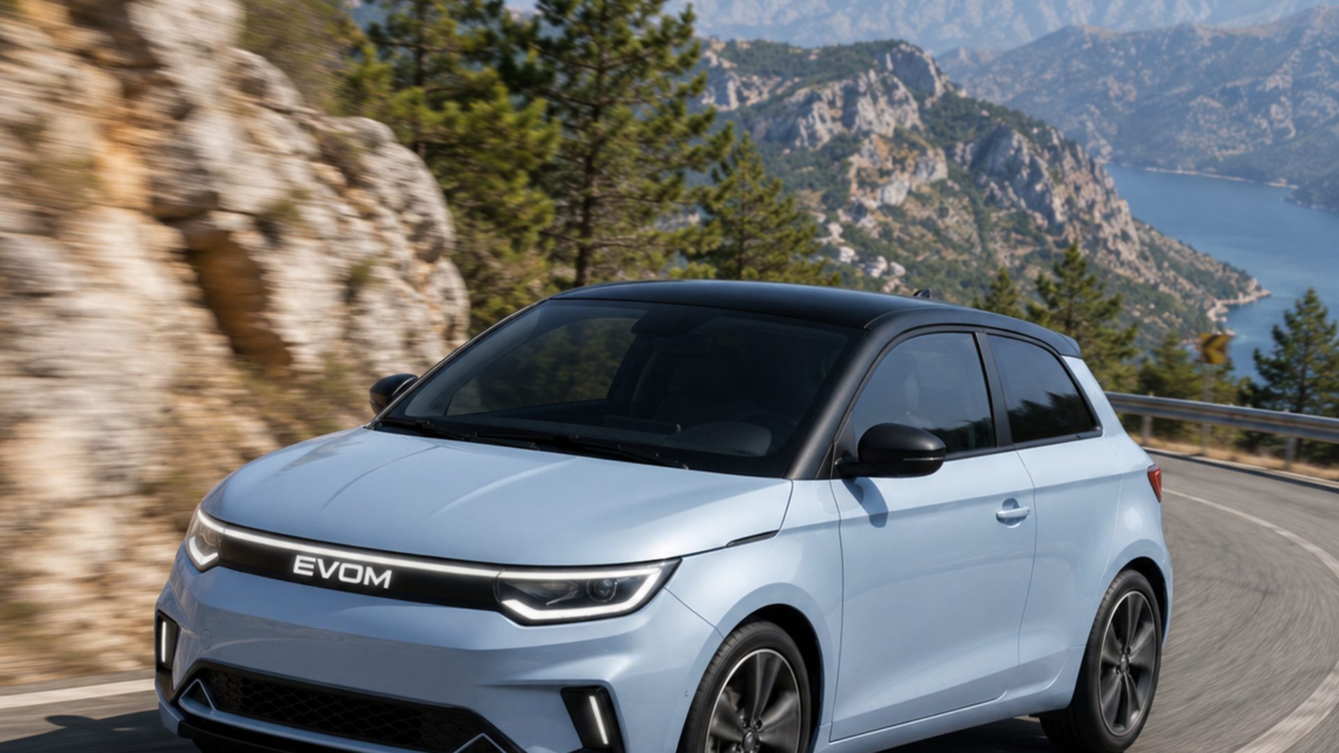 Render of the EVOM compact electric vehicle on a mountain road above the Montenegrin coast