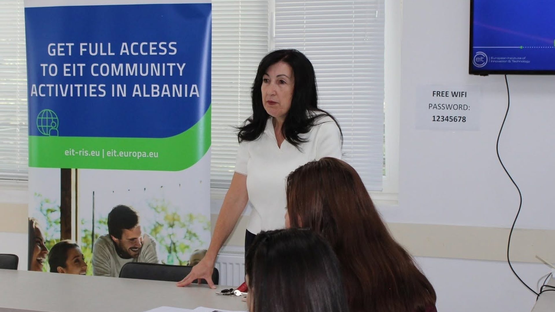 Dr. Aida Gambeta welcoming participants to the EIT Info Day in Korça