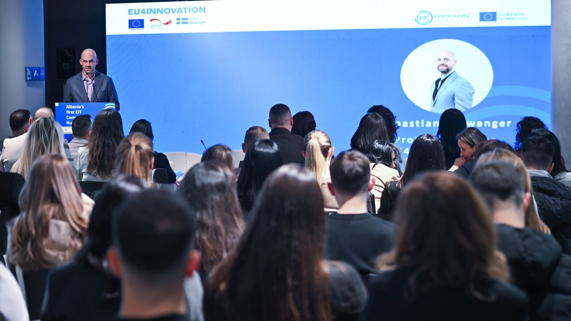 Audience following a presentation at Harvesting Innovation with EIT Health