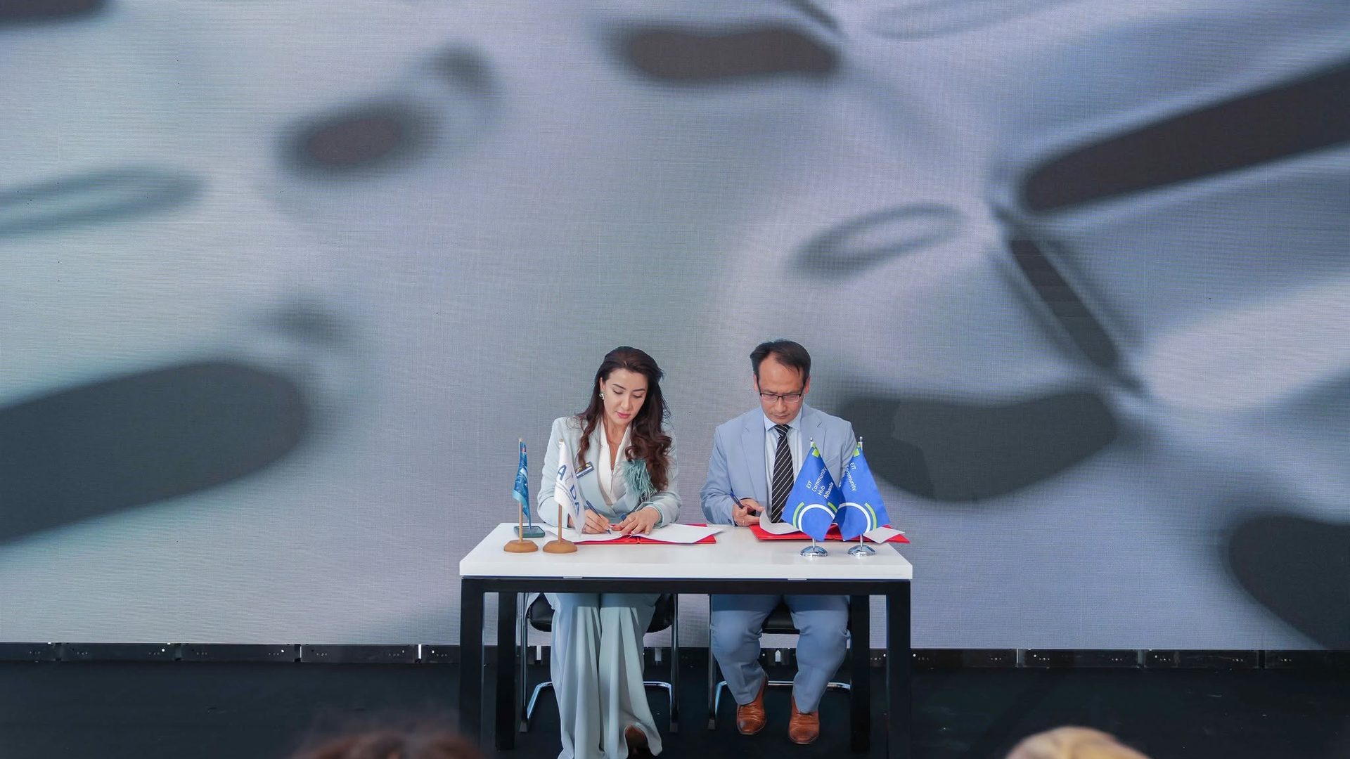 AIDA and 28Digital representatives signing the Memorandum of Understanding