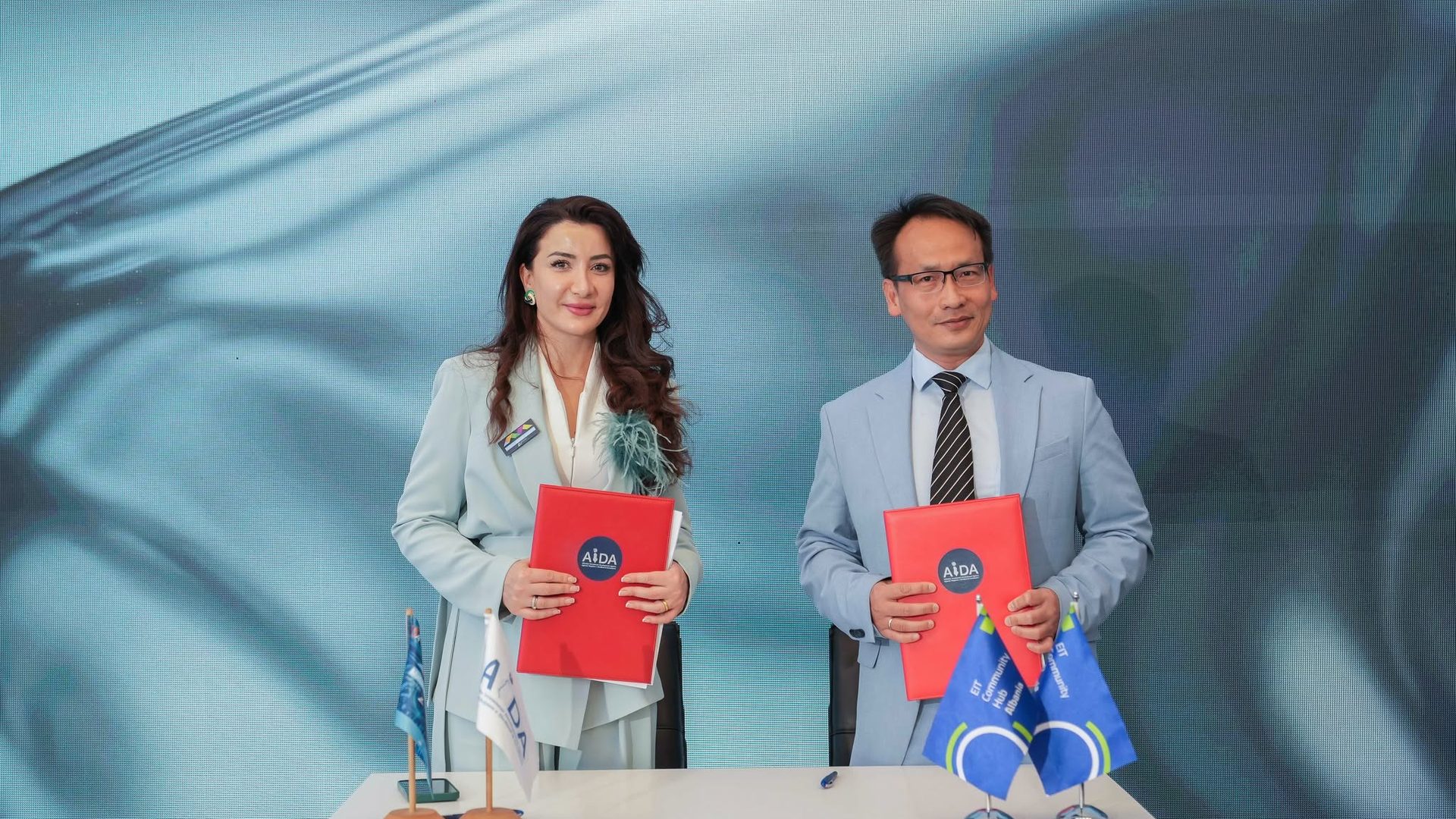 AIDA and 28Digital representatives holding the signed MoU at MatchMaker 2026